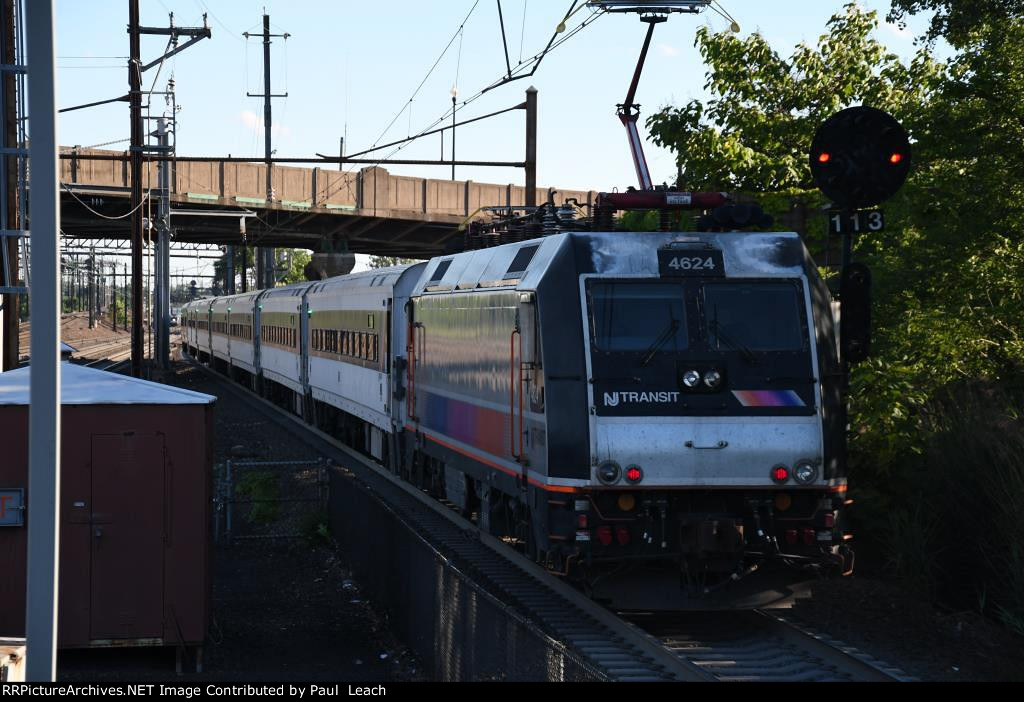 Outbound commuter shoves out of the station